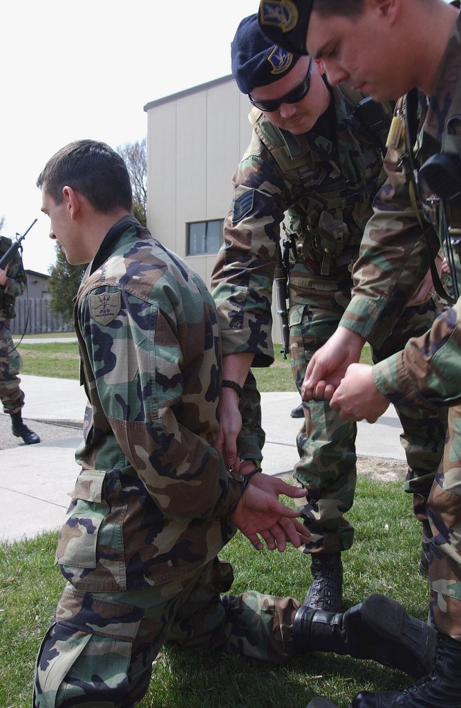 As part of the Operational Readiness Exercise, US Air Force Staff Sergeant Erik E Clemenson and U...