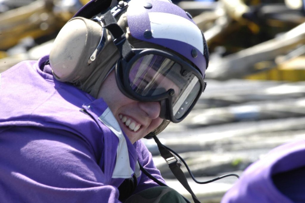 A Sailor assigned to Air Department, V-4 division aboard USS Abraham Lincoln (CVN 72), joins flig...