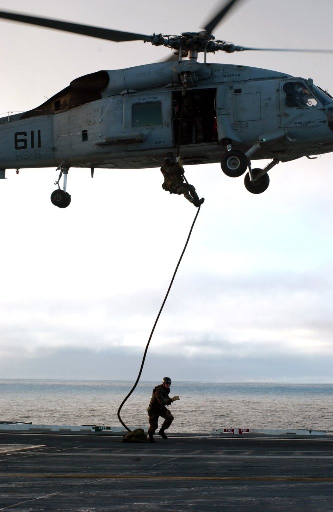 South Pacific Ocean (June 19, 2004) - Members assigned to Explosive Ordnance Disposal Mobile Un...
