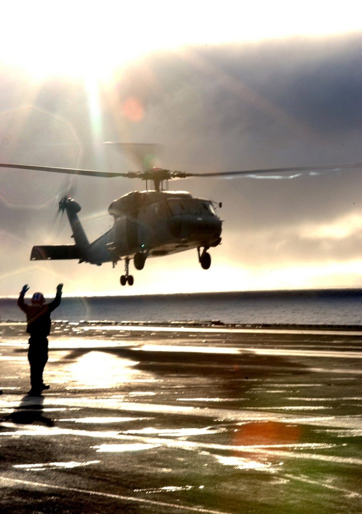 A Landing Signalman Enlisted (LSE) aboard the Nimitz-class aircraft carrier USS Ronald Reagan