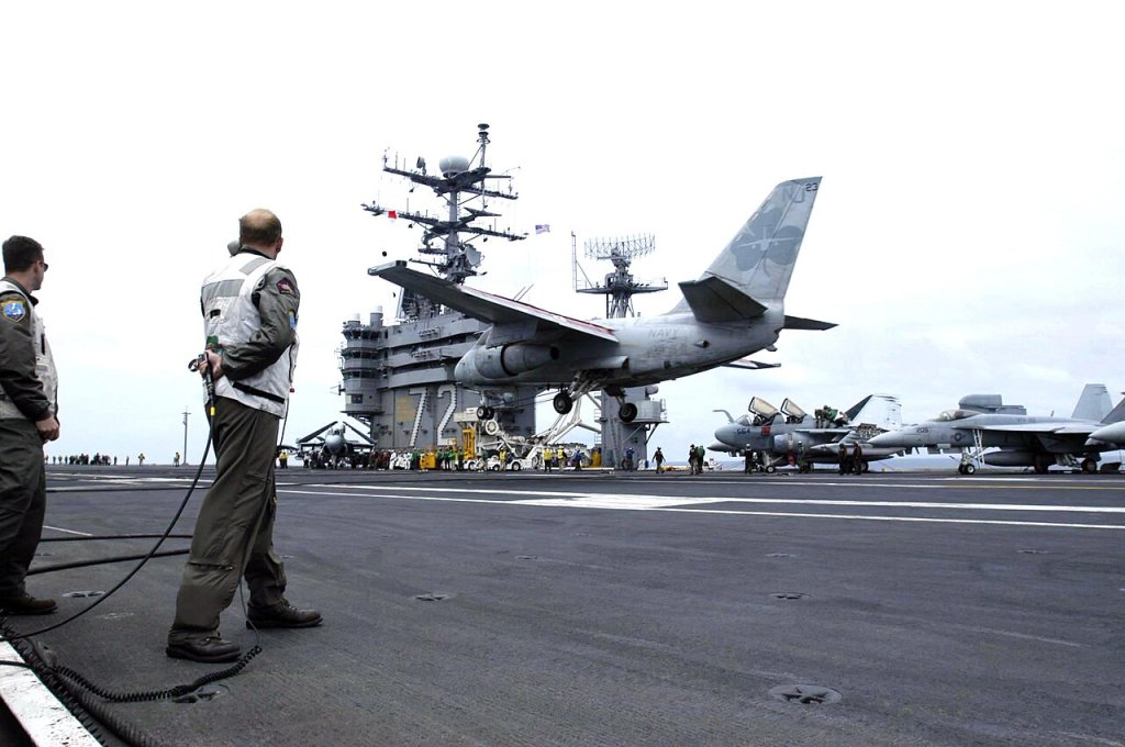 Pacific Ocean (June 19, 2004) - A Landing Signal Officer (LSO) monitors the arrested landing of...