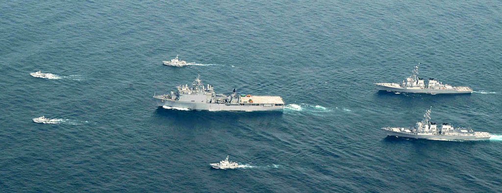 Ships of the combined Cooperation Afloat Readiness and Training (CARAT) task group steam together...