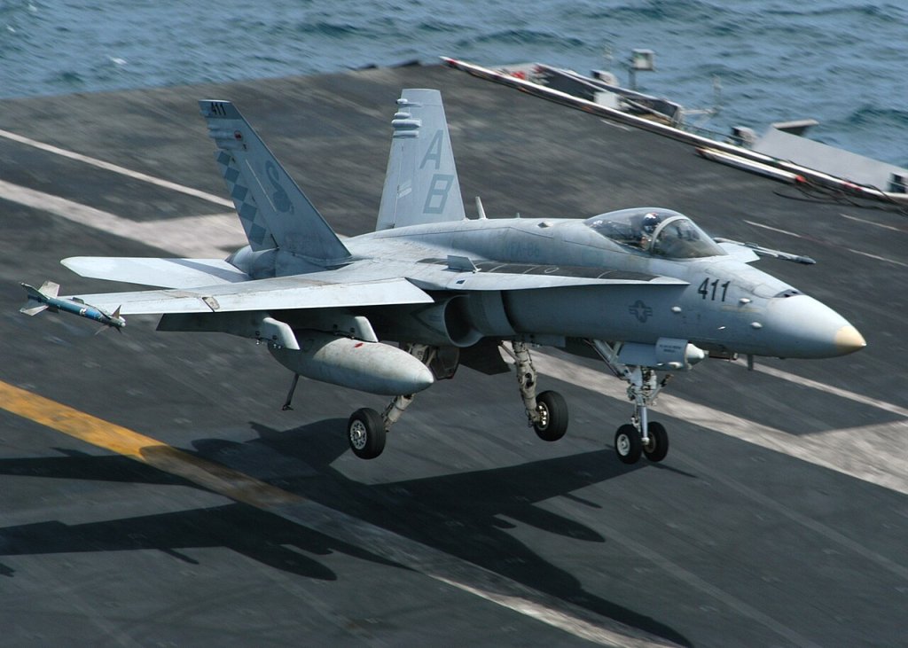 An F/A-18C Hornet assigned to the "Sidewinders" of Strike Fighter Squadron Eight Six (VFA-86) mak...