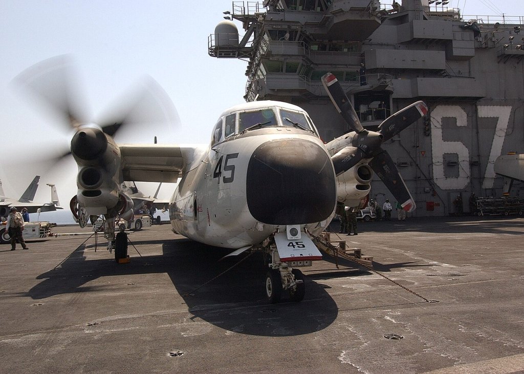 A C-2 Greyhound assigned to "Rawhides" of Fleet Logistics Support Squadron Four Zero (VRC-40)...
