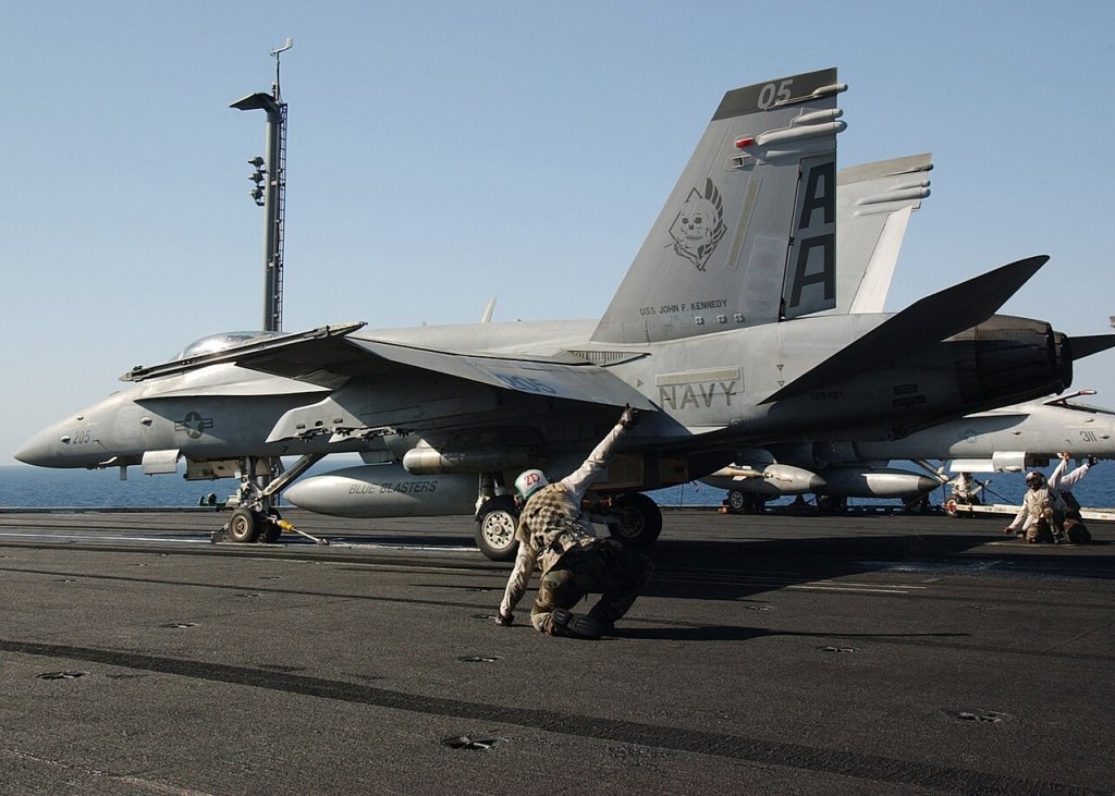 Members of the catapult crew assigned to the "Blue Blasters" of Strike Fighter Squadron Three...