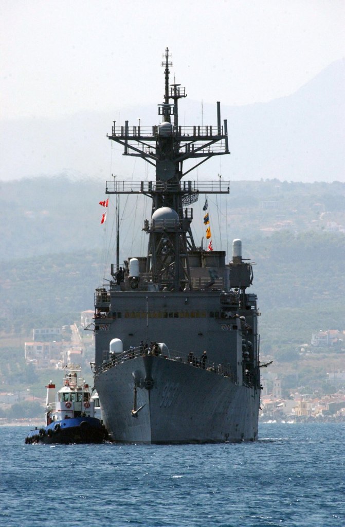 Souda Bay, Crete, Greece (July 19, 2004) - The destroyer USS Spruance (DD 963) is escorted by t...