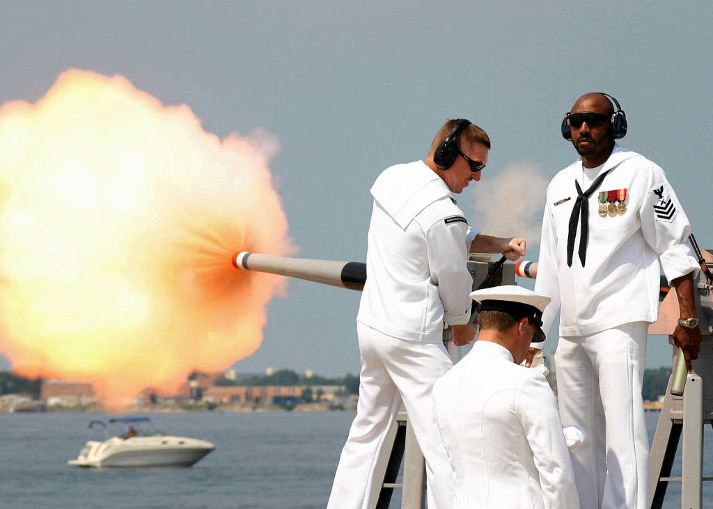 Soldiers firing a 40mm saluting cannon
