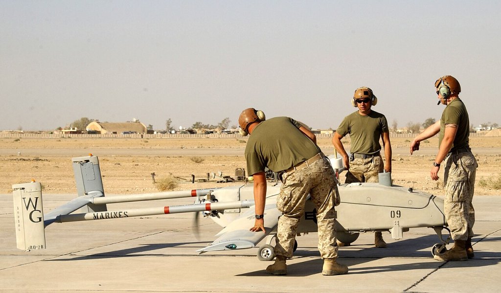 Airframes mechanics with Marine Unmanned Aerial Vehicle Squadron 1 at Al Taqaddum, Iraq, perform ...