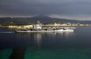 Starboard beam view of USS George Washington departing Souda Bay