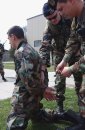 As part of the Operational Readiness Exercise, US Air Force Staff Sergeant Erik E Clemenson and U...
