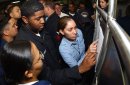 Ship's Serviceman 3rd Class Jennifer Elenes, of Santa Fe Springs, Calif., Aviation Ordnanceman 1s...