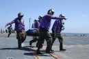 Pacific Ocean (June 4, 2004) - USS Abraham Lincoln (CVN 72) Sailors from Air Department's V-4...
