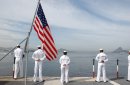 Aboard USS Ronald Reagan (CVN 76), June 9, 2004 - Sailors "Man the Rails" while a color detail ti...
