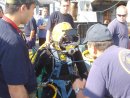 A Master Diver from Mobile Diving and Salvage Unit Two (MDSU-2) provides safety instructions to a...