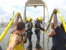 Divers from Mobile Diving and Salvage Unit Two (MDSU-2) and the Bulgarian Navy prepare to enter t...