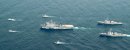 Ships of the combined Cooperation Afloat Readiness and Training (CARAT) task group steam together...