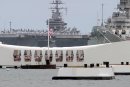 Sailors aboard the Nimitz-class aircraft carrier USS John C