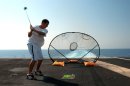 Red Sea (July 4, 2004) - Sailors take time out for a little golf on the fantail during a "Ste...