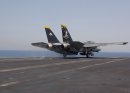 An F-14D Tomcat assigned to the "Jolly Rogers" of Fighter Squadron 103 (VF-103) departs for a fli...
