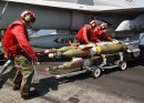 040709-N-4374S-021.JPG Arabian Gulf (July 09, 2004) - Aviation Ordnancemen assigned to the "Sunli...
