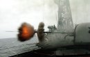 A round is fired from the ship's MK-75 76mm gun aboard the guided missile frigate USS Crommelin