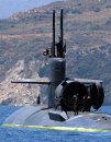 The Los Angeles-class attack submarine USS Dallas (SSN 700) departs Souda Bay harbor following a ...