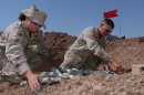 Airmen prepare ammunition fuses, flares and 50 caliber rounds for disposal